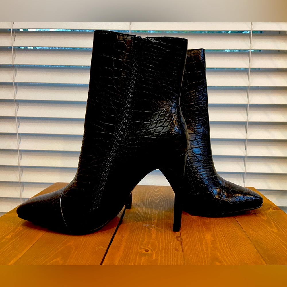Black heeled booties. 8.5, 4 inch heel